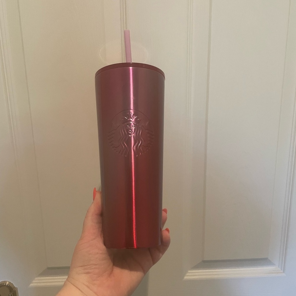 Pink and red tin Starbucks tumbler